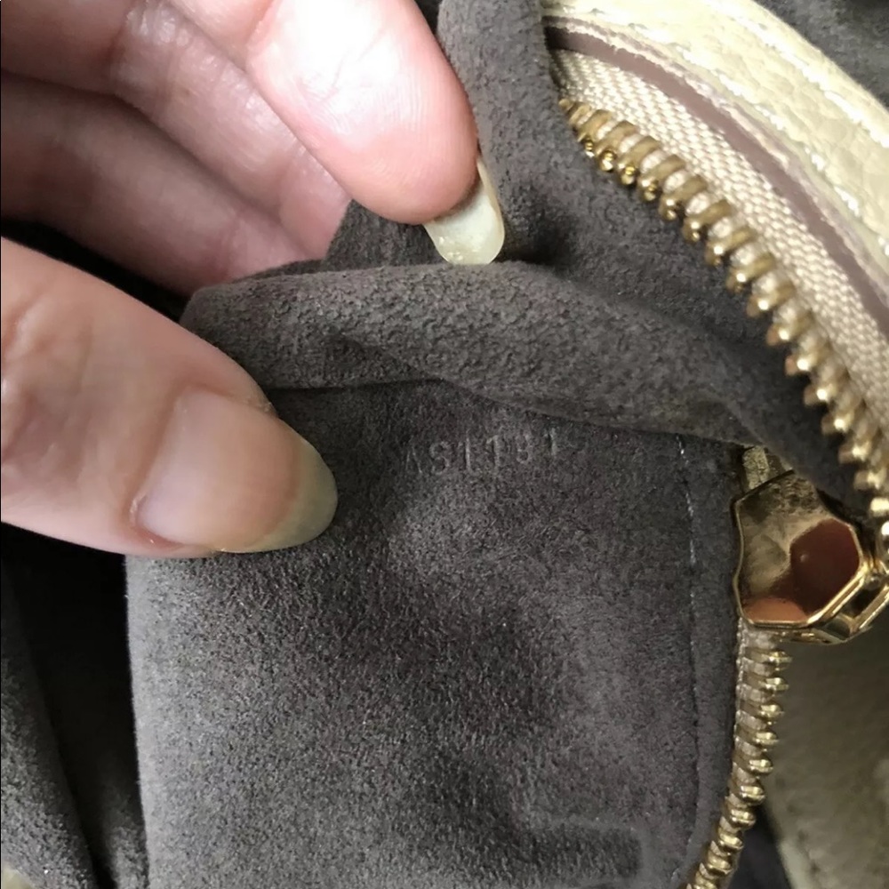 Louis Vuitton Mahina bag